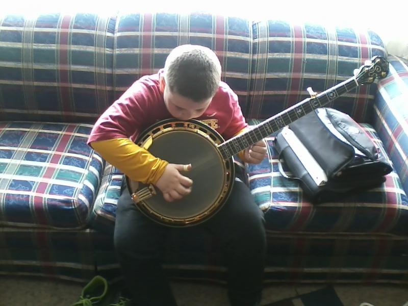 squatch's son playing banjo