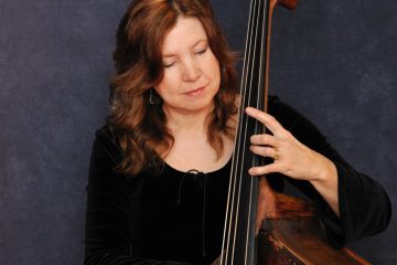 Missy Raines playing bluegrass bass