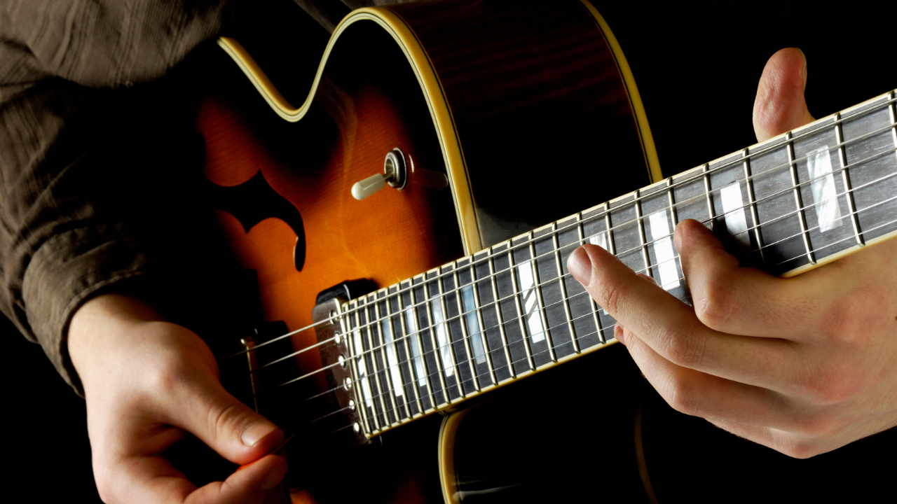 man playing guitar