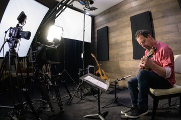 Mike Marshall recording mandolin lessons in the ArtistWorks studio
