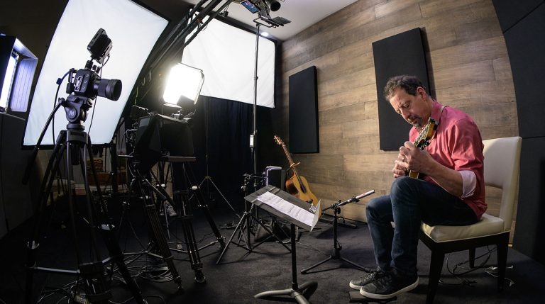Mike Marshall recording mandolin lessons in the ArtistWorks studio